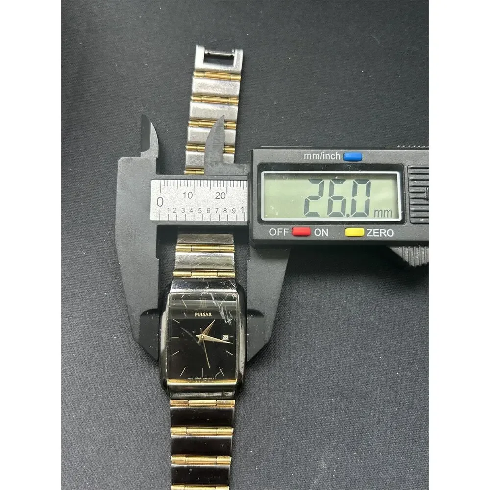 Pulsar Black And Gold Tone Women’s Quartz Watch